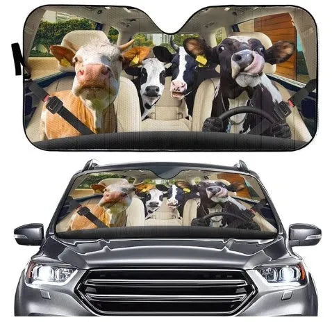 Telescopic aluminium foil car sun shield expanded on a dashboard