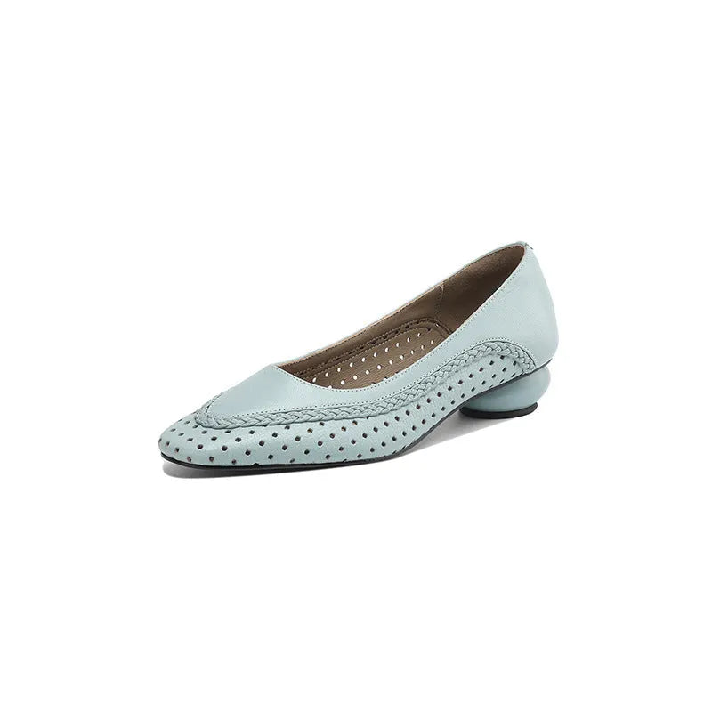 Women's beige sheepskin sandals with hollow-out design, round toe, and mid heel.