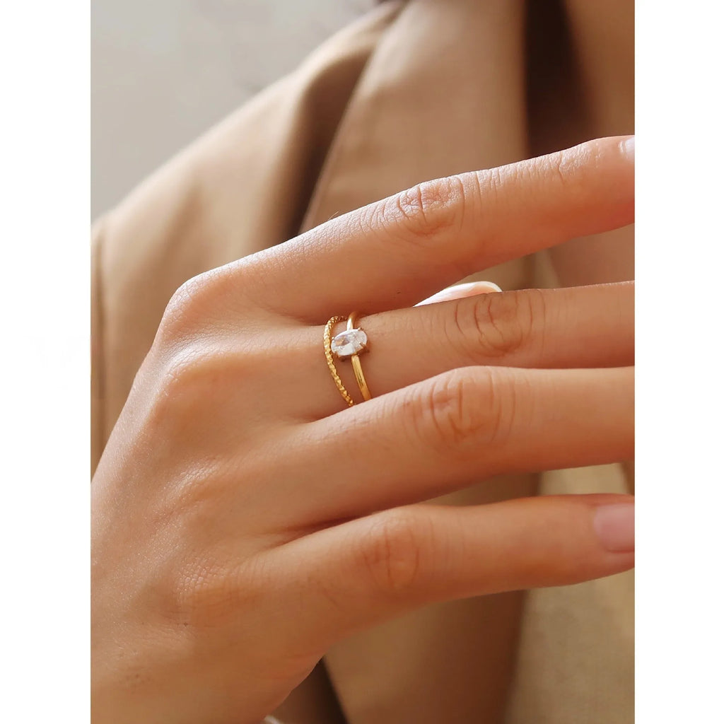 Women's golden heart-shaped stainless steel ring with love design in multiple sizes