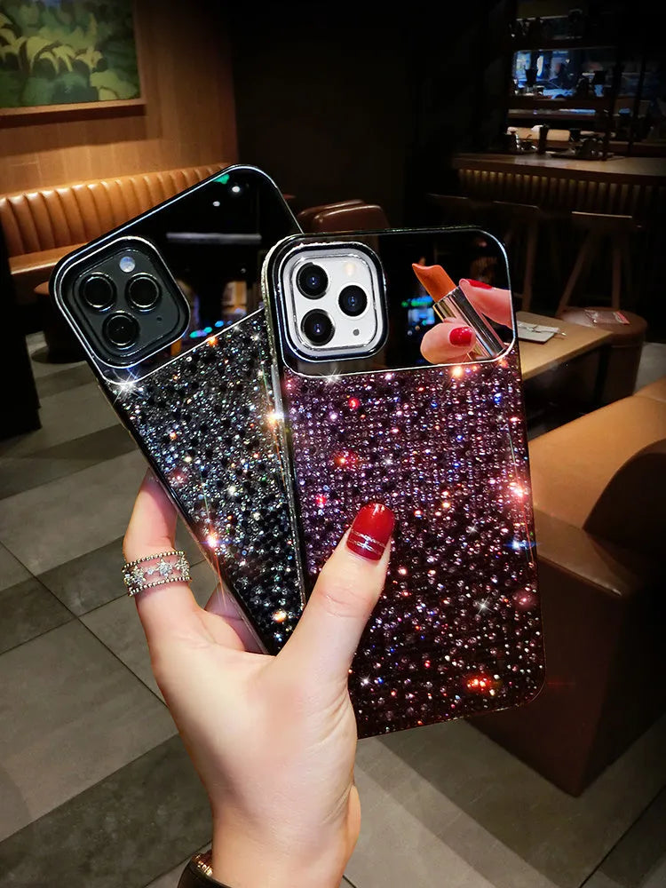 Gradient rhinestone silicone iPhone case for Apple models, available in blue, black, and purple.