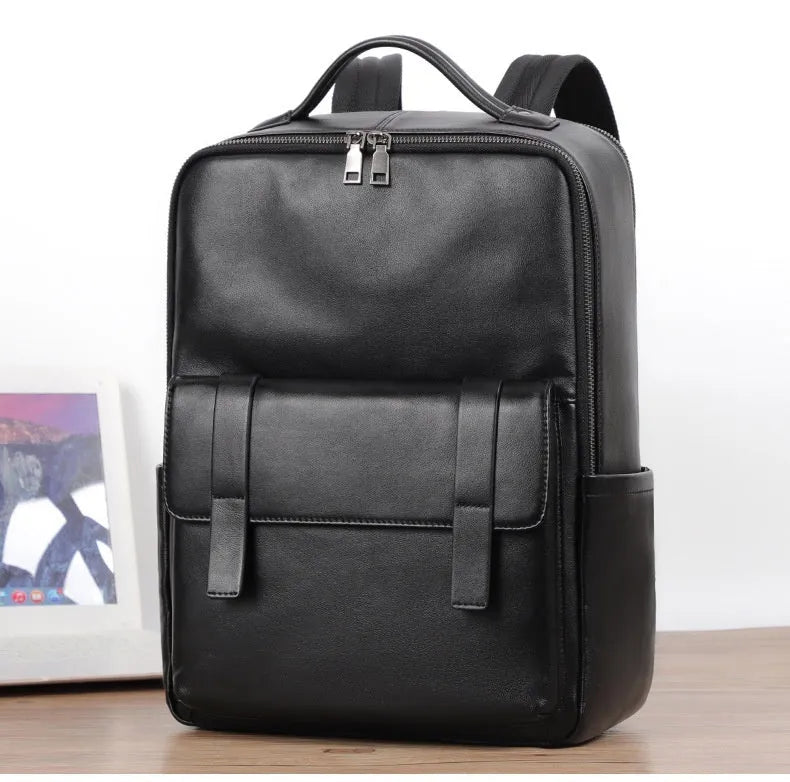 Men's black genuine leather computer backpack with 36-55 litre capacity and business styling