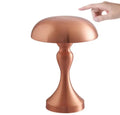 Metallic USB rechargeable LED desk lamp with touch control showing bronze, gold, and silver colour options.