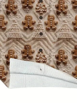 A loose-fit digital printed top with a lapel collar, shown on a hanger.