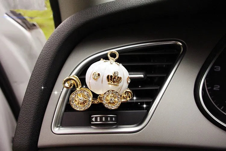 Alloy car perfume clip with liquid fruity scent attached to air vent in various cartoon styles