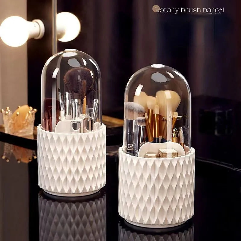 White rotating makeup brush storage box with transparent dust-proof cover on desktop