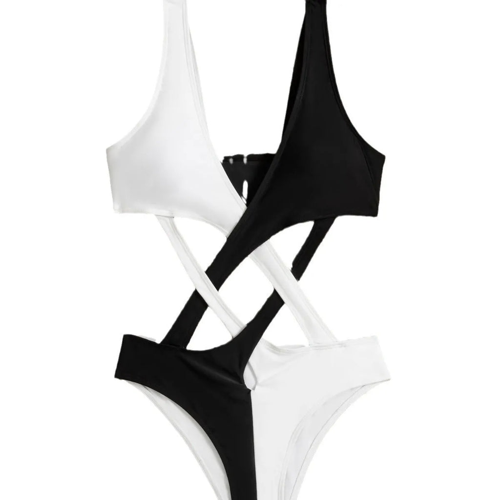White women's one-piece swimsuit with colour-block pattern and hollow-out detailing