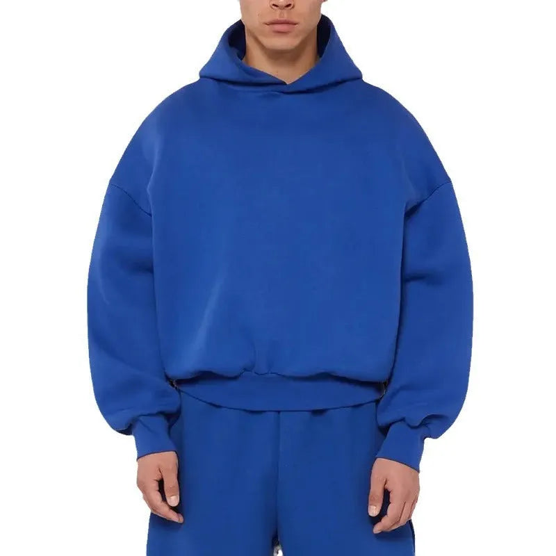 Man wearing a solid colour fleece-lined cotton pullover sweater with a wool lining.