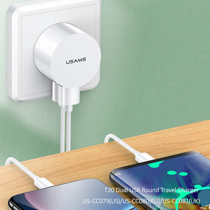White portable USB phone charger with built-in US EU UK adapter plugs showing compact dimensions