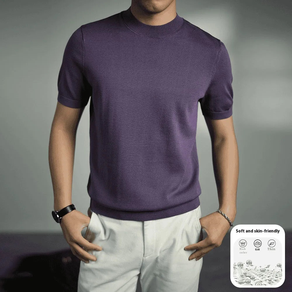 Man wearing a silver grey knitted round neck t-shirt with short sleeves.