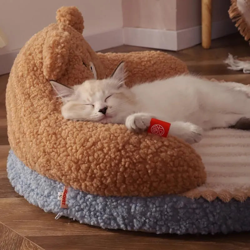 Washable cat bed with high backrest, removable cushion, and non-slip bottom in brown or pink