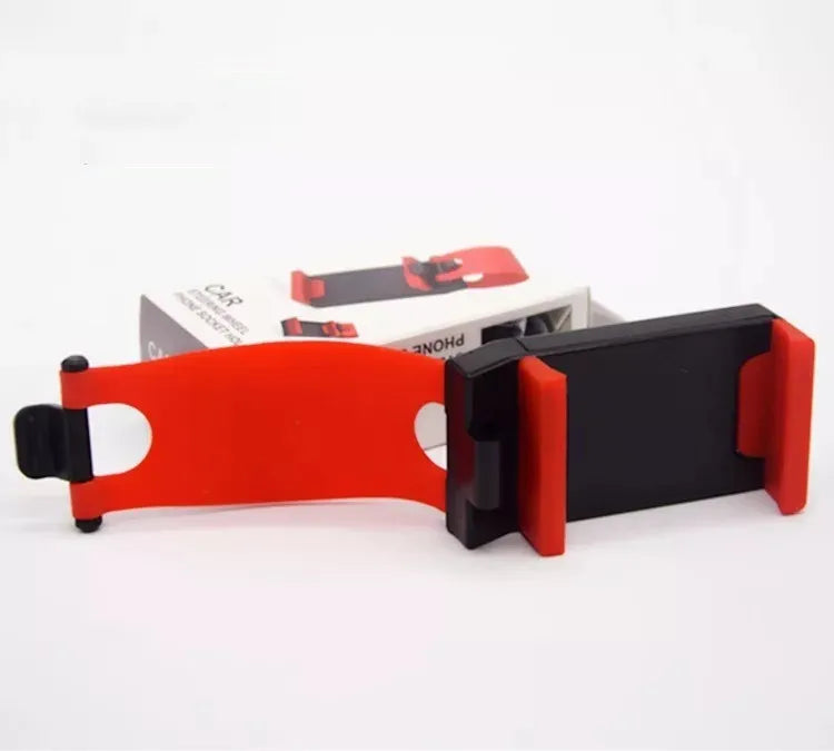 Black ABS plastic car steering wheel phone holder showing mounting position