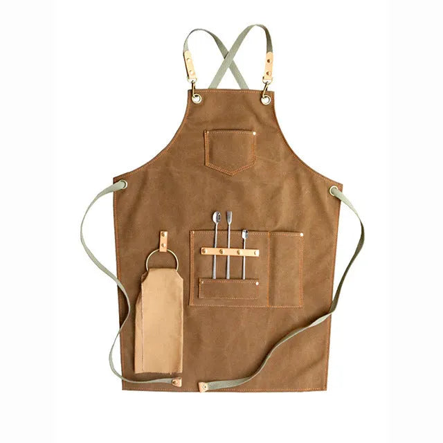 Canvas work apron with cross-back straps in camel colour for cafe and baking use