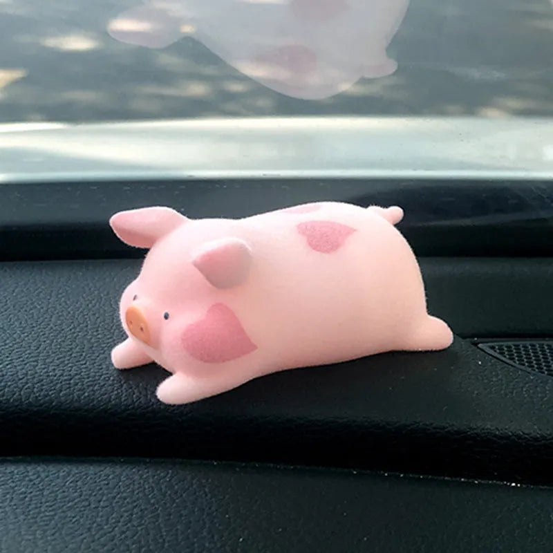 Cartoon pig resin car decoration accessory on vehicle dashboard