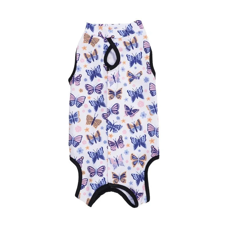 Cat wearing sterilisation recovery suit with Velcro closure in colourful print design