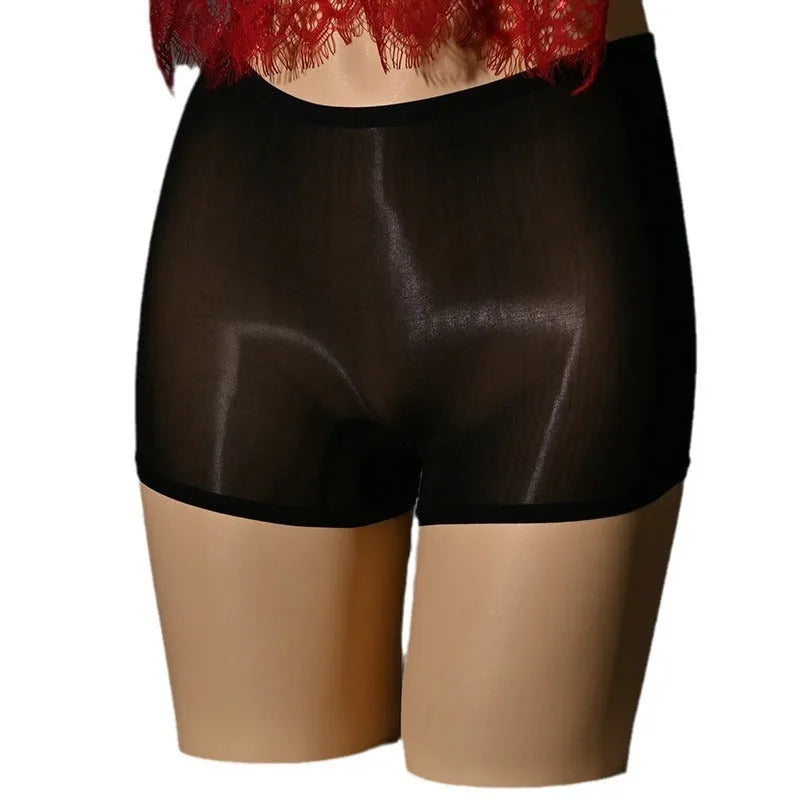 Men's shiny nylon seamless underwear shorts in mid-waist cut, shown in red colour.