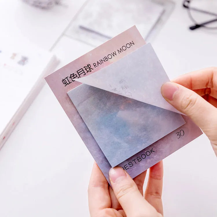 Square planet-themed sticky notes notepad showing oil painting designs of moon, earth, and mars