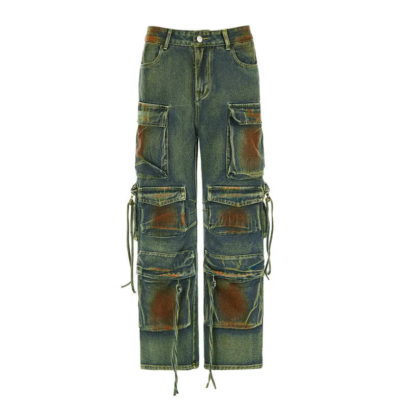 Loose blue denim cargo trousers with gradient colour pockets and a colour bloom wash