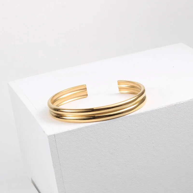 Double curved titanium steel bracelet for women, gold with pearl inlay, geometric style