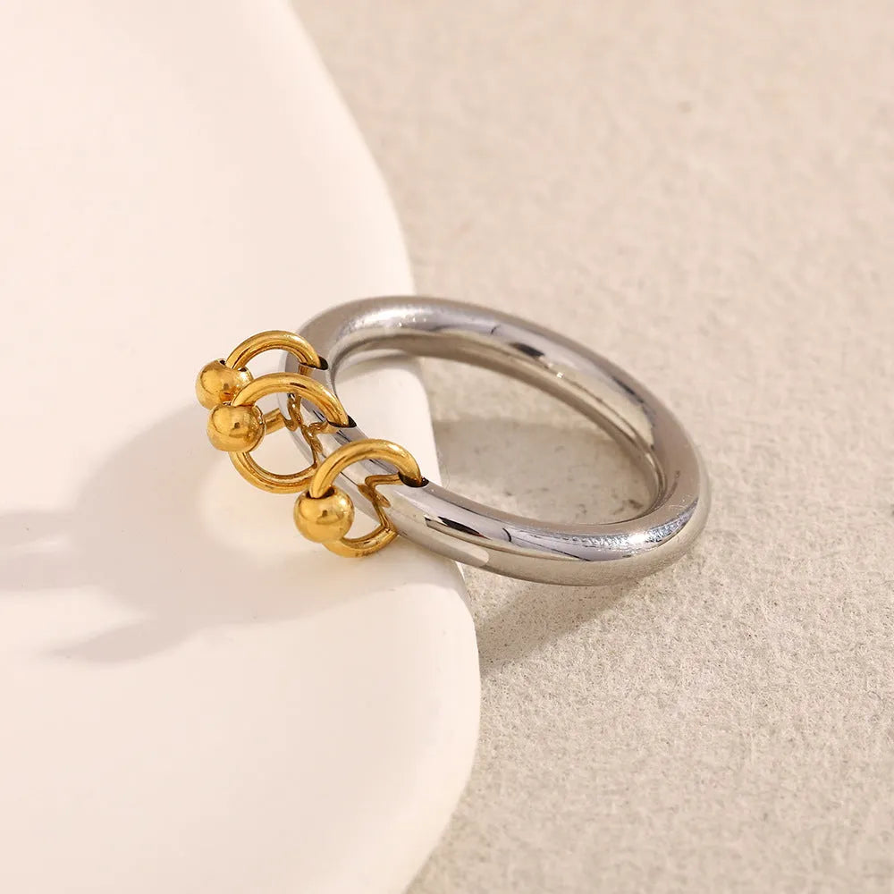 Two-tone stainless steel round beads tassel ring for women, shown in sizes No 6, No 7 and No 8