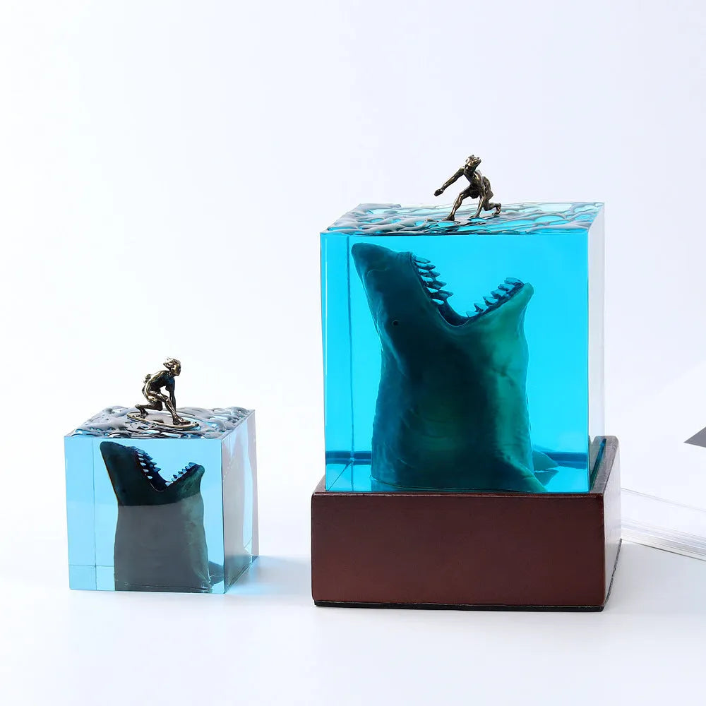 Clear epoxy resin ornament showing shark surfing on wave with integrated night light