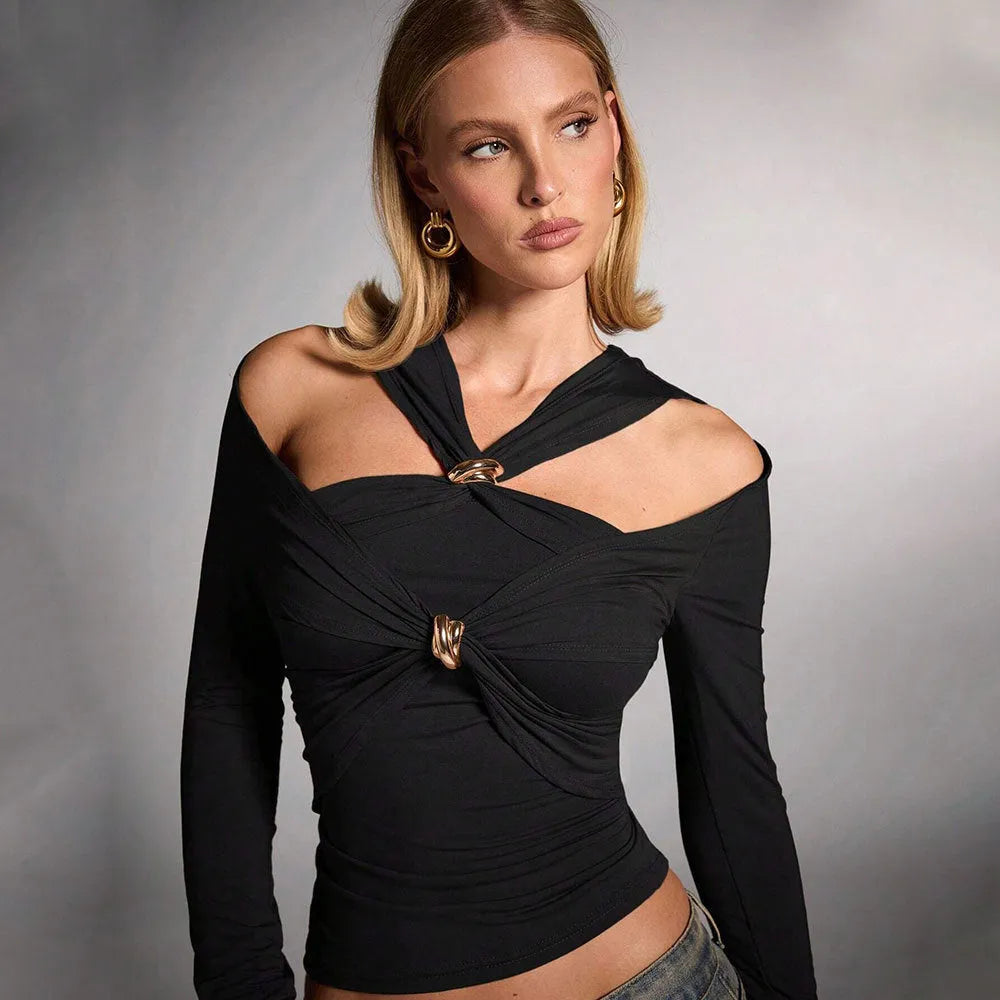 Women's black halter top with shoulder-baring neckline, long sleeves, and slim fit silhouette