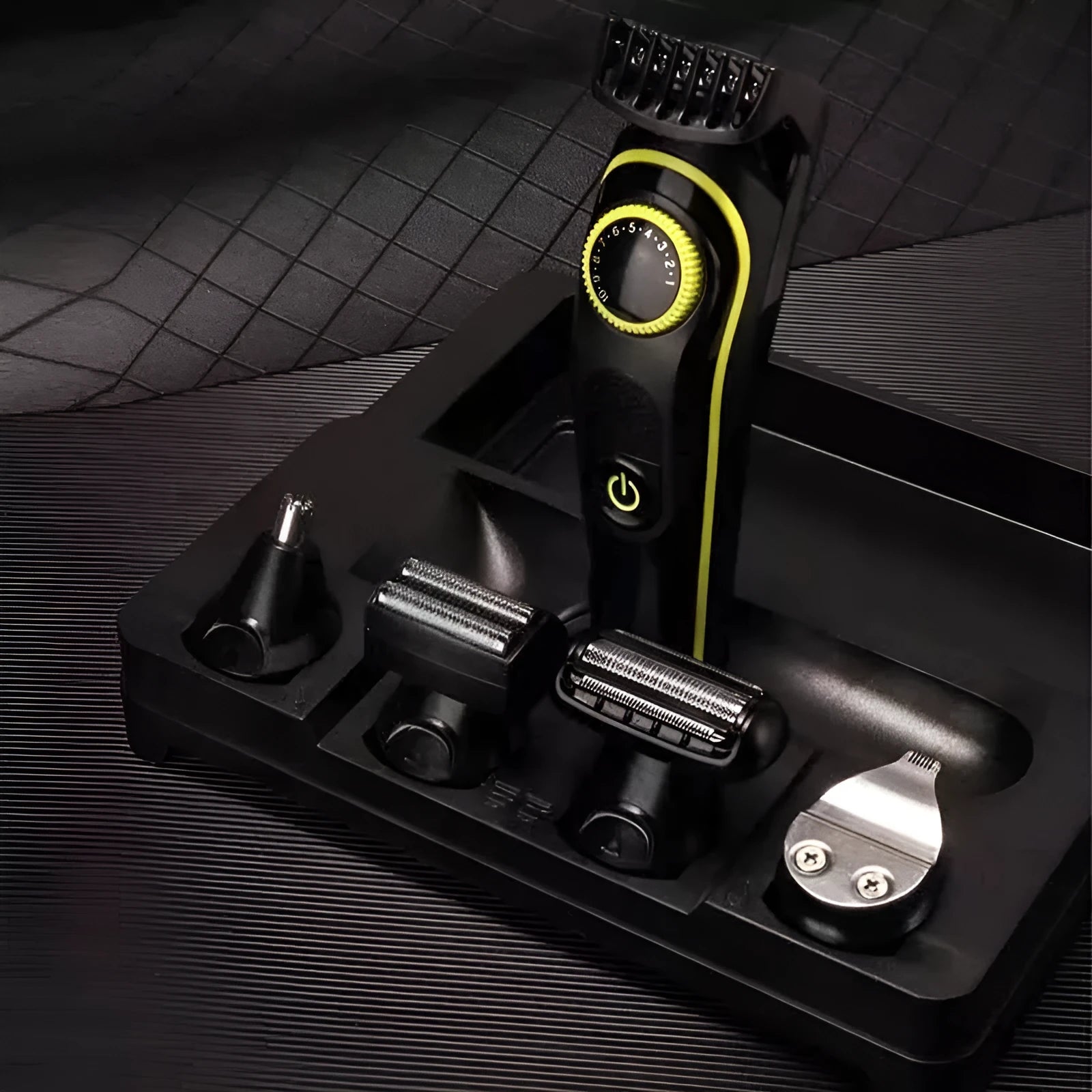 Black KM-696 household rechargeable electric hair clipper set with USB cable, grinding head, and cleaning brush.