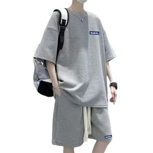 Waffle-textured leisure sports suit in cotton-polyester blend with short sleeves and shorts
