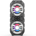 Portable Bluetooth audio speaker with colour lights and pull rod handle in blue, red, or silver grey