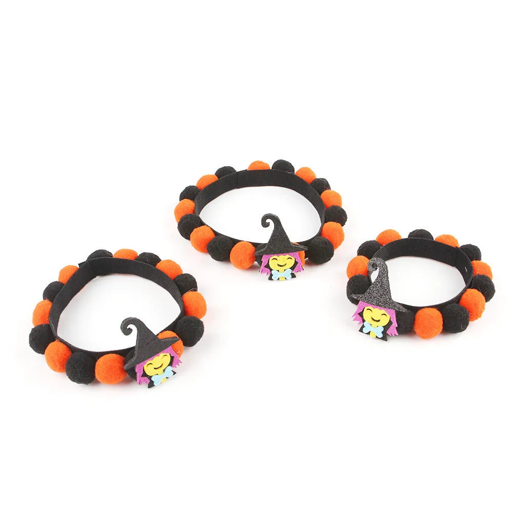 Halloween pet collar with fur ball decoration in orange pumpkin design