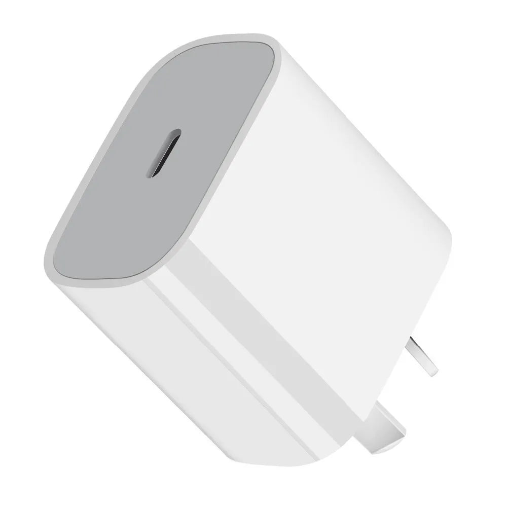 White 20W USB-C PD wall charger with UK three-pin plug.