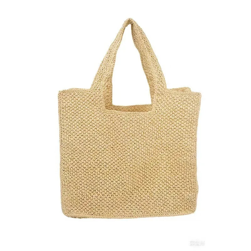Khaki woven straw bucket tote bag with double straps, open pocket, and horizontal square shape