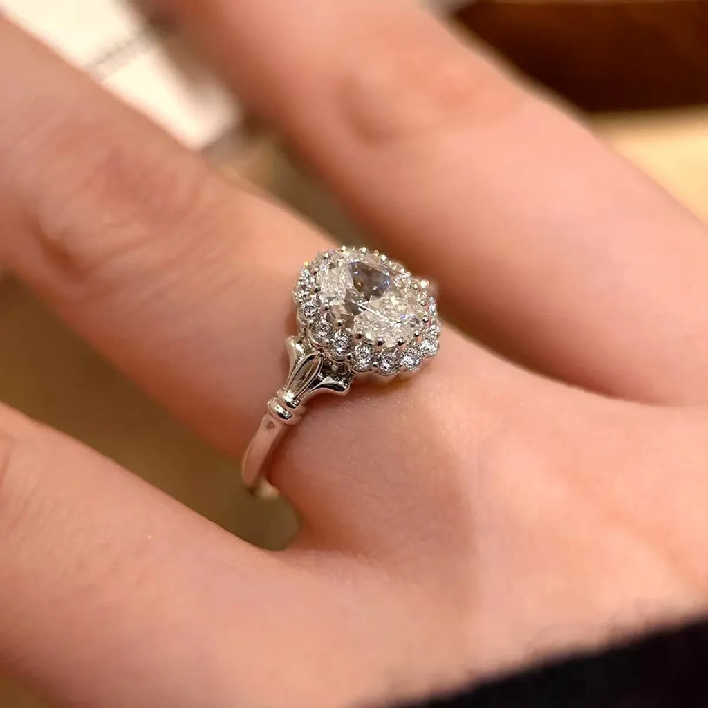 Adjustable silver geometric ellipse bridal bouquet ring with diamond surface treatment