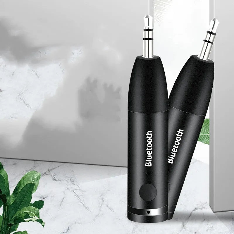 Compact black Bluetooth audio receiver for car and home stereo AUX inputs