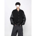 Black loose faux leather coat with longfengni patchwork, polyester lining and side seam pockets