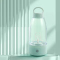 Automatic electric shaker bottle with USB charging port and handle in green, pink, and white colours