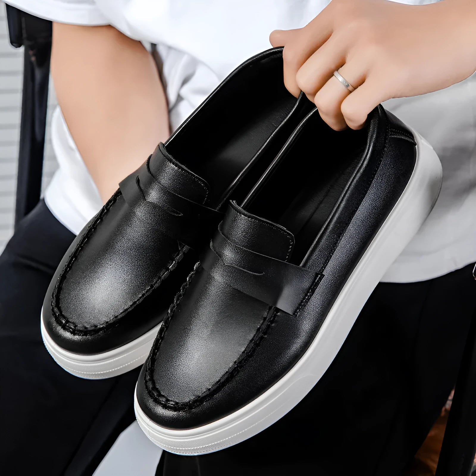 Men's casual slip-on loafers in PU leather with round toe, shown in white, black and white, and khaki colours