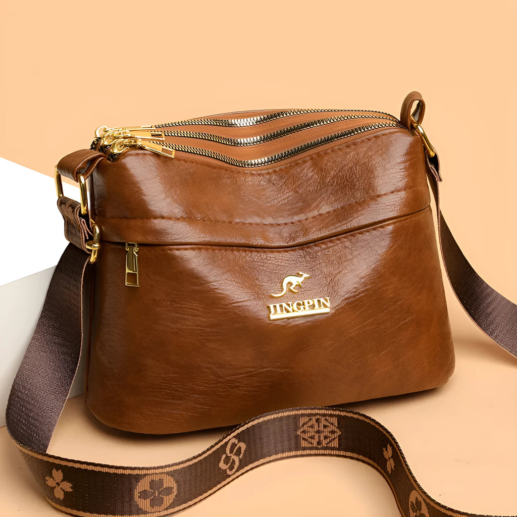 Brown PU leather cross body messenger bag with multiple compartments and sandwich pocket design