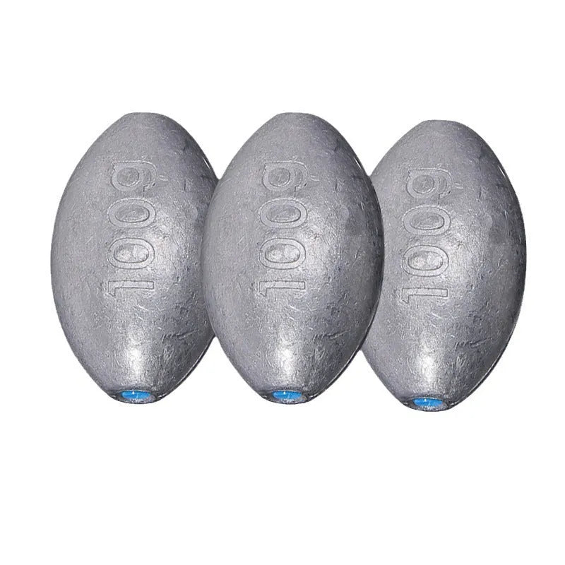 Olive lead fishing sinker with scale pattern showing rugby shape and plastic core construction