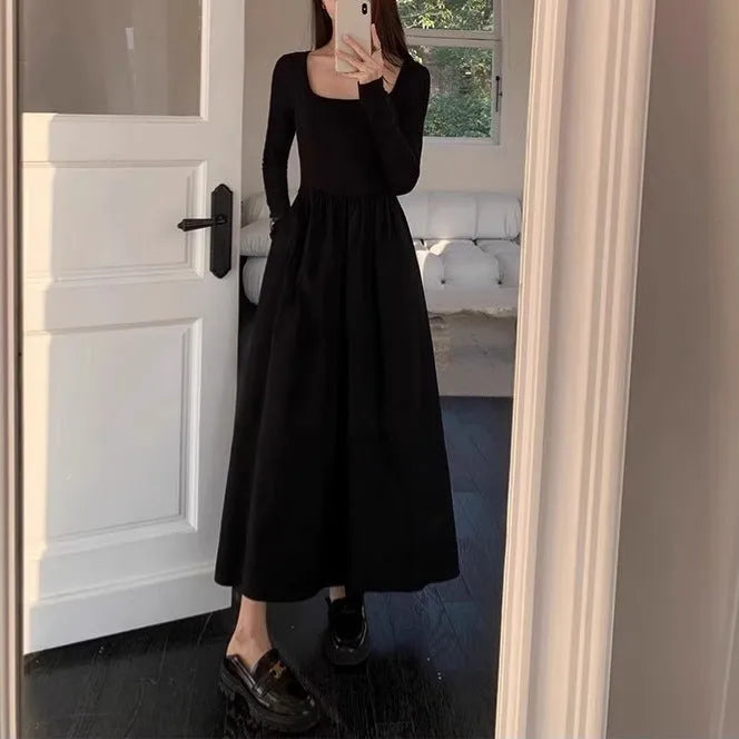 Women's black square collar knitted A-line dress with long sleeves and an elastic waist.