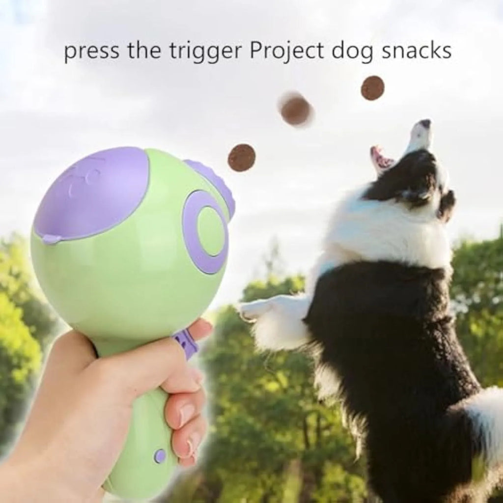 Green dog treat launcher toy for remote feeding and training with plastic construction