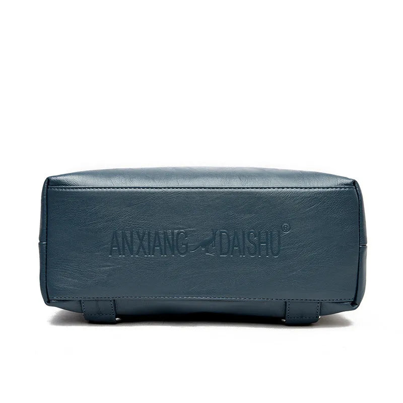 Anti-theft password backpack for women in blue with PU outer, nylon lining, soft build and outer slit pocket