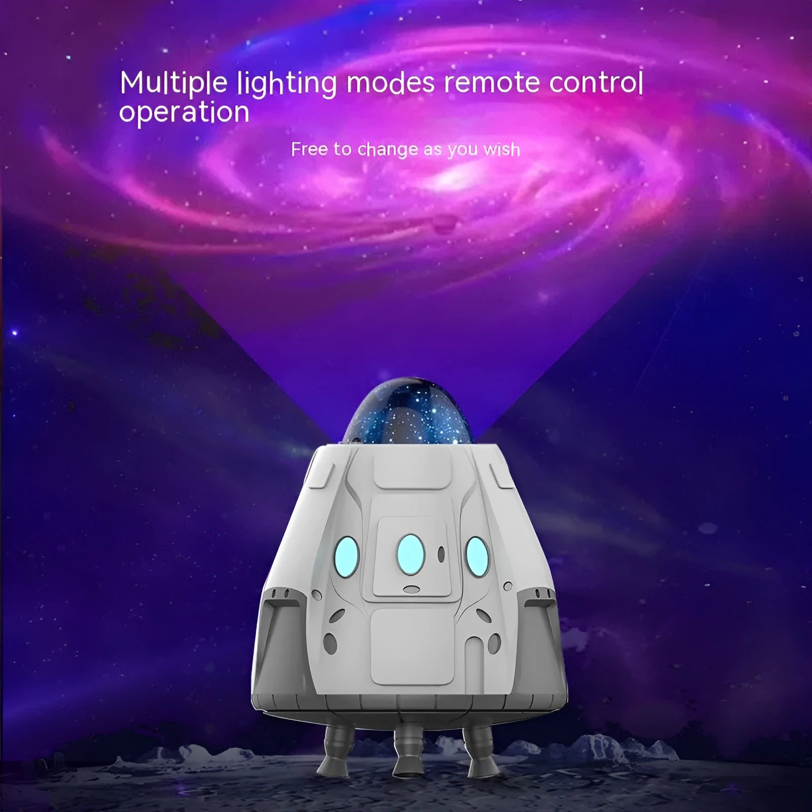 White space capsule shaped Bluetooth Northern Lights ambience light with remote control on a dark surface.