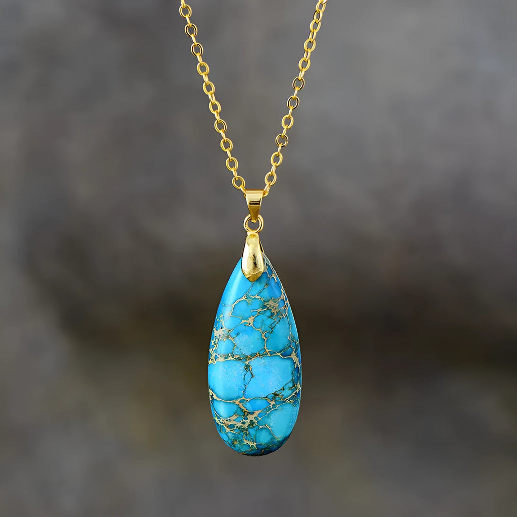 Jade water drop pendant on an 18K gold plated chain, showing hongjin colour finish.