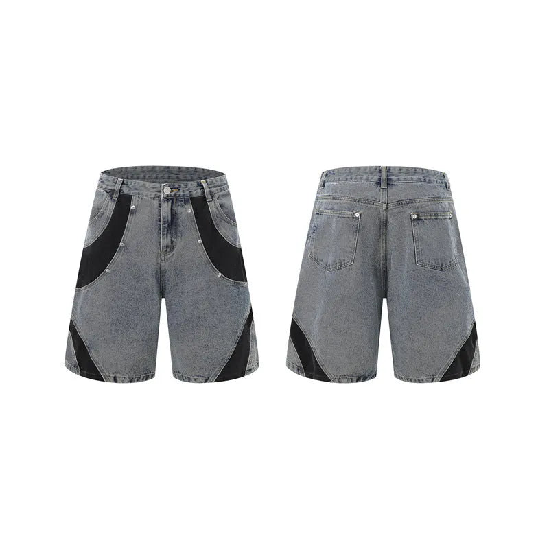 Retro washed blue denim suit set featuring a short-sleeved jacket and matching trousers on a rack.