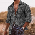 Men's loose fit long sleeve shirt with a colourful 3D floral pattern, on a model.