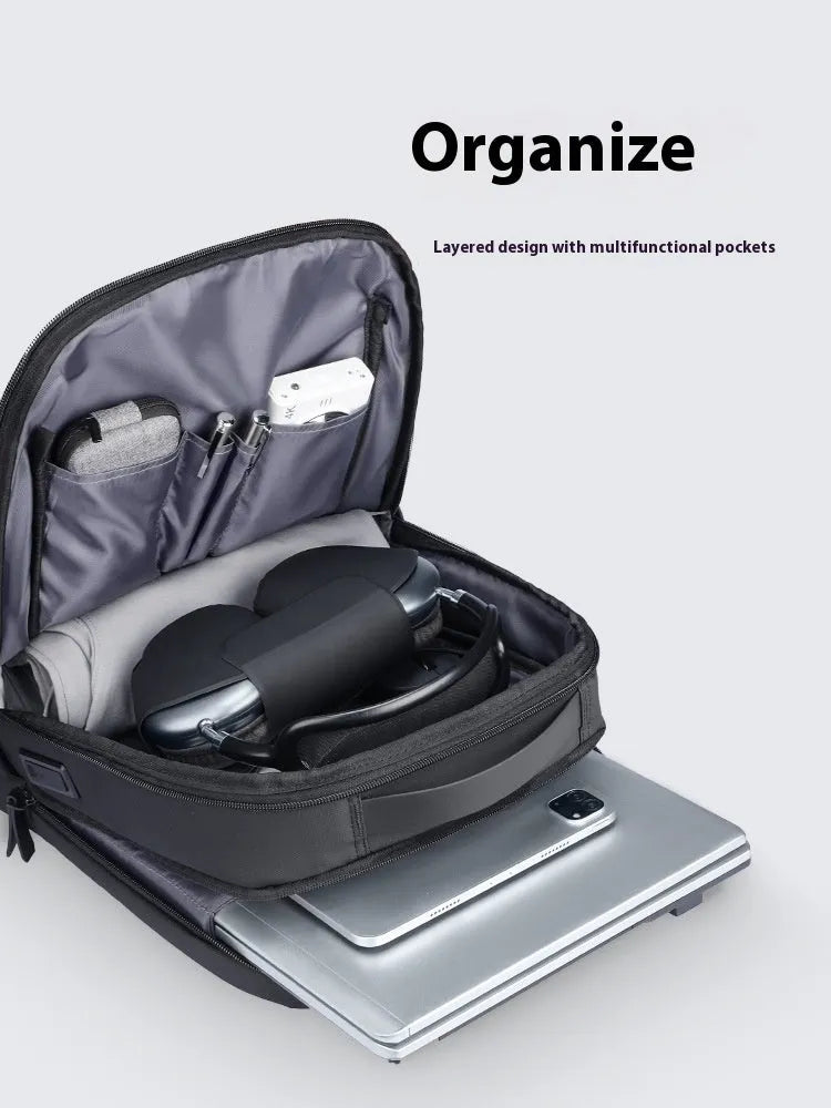Graphite grey Oxford cloth USB charging backpack with external port and professional design.
