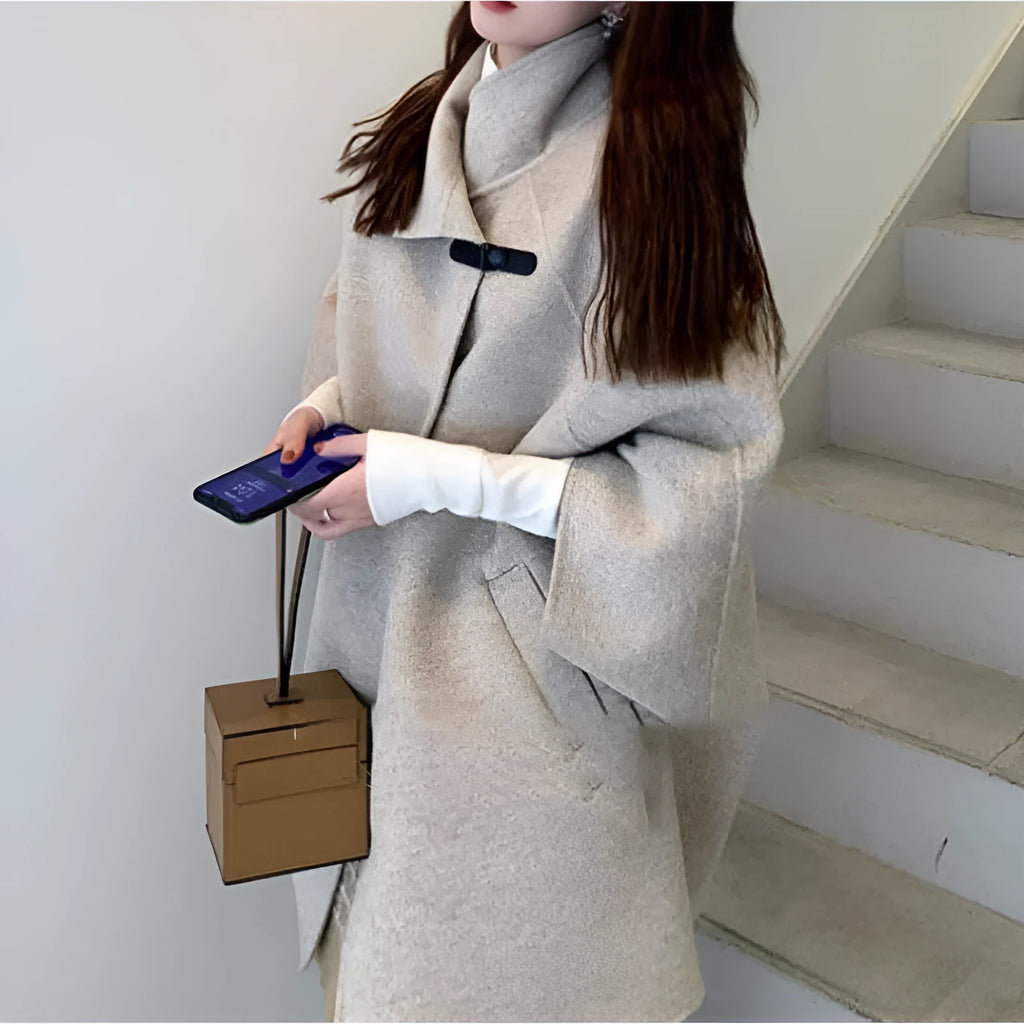 Women's oatmeal colour acrylic coat with flight sleeves and 100cm extended length