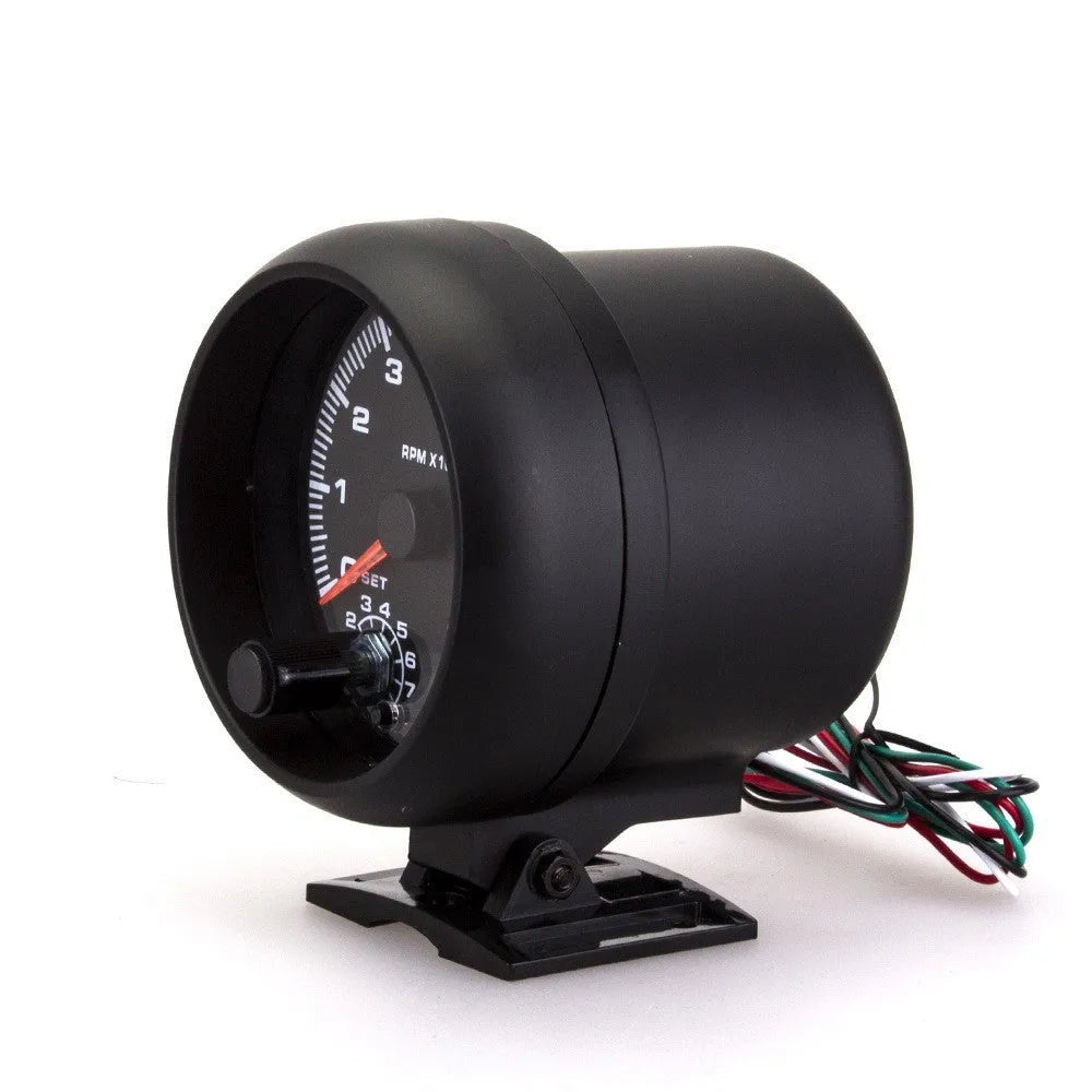 Black automotive tachometer with blue illuminated pointer display showing rpm measurement scale