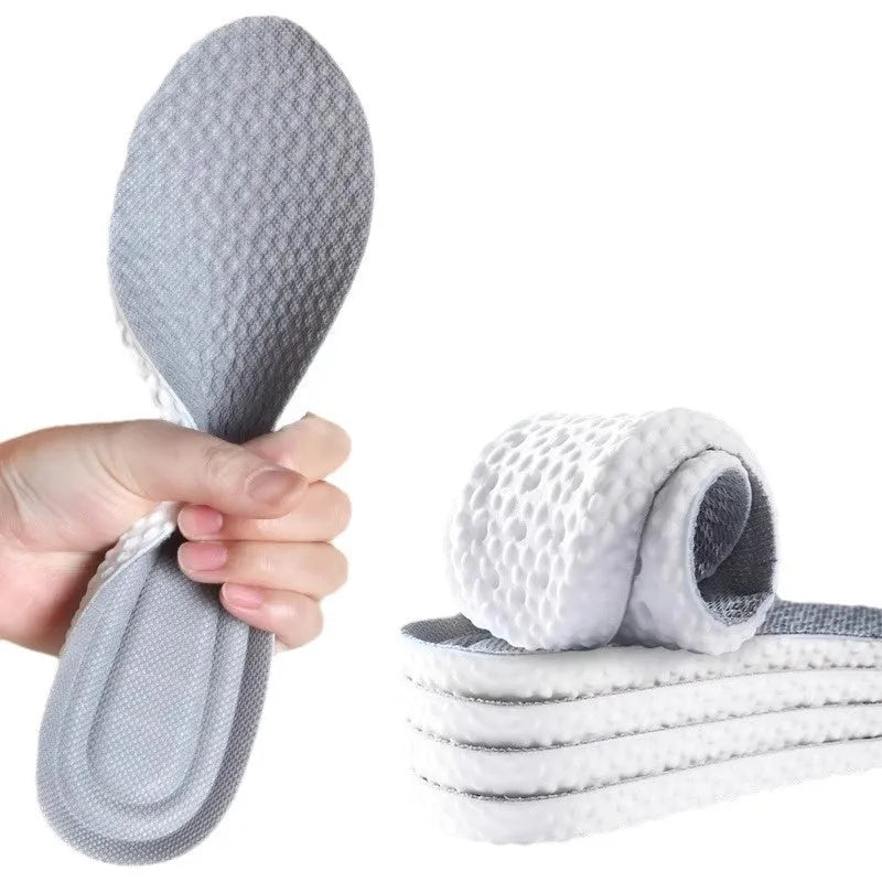 Breathable PU sports insoles in black, grey, or orange colours with trimmable edges for custom fit.