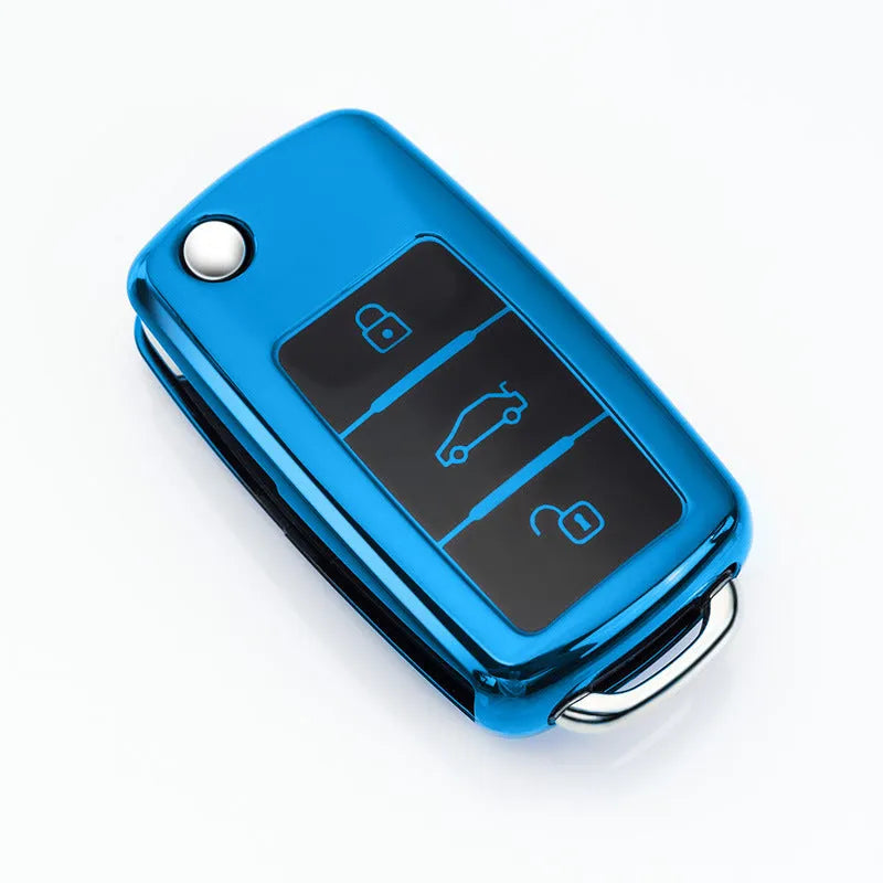 VW Model A car key case in four colours: blue, pink, red, and silver with buckle attachment